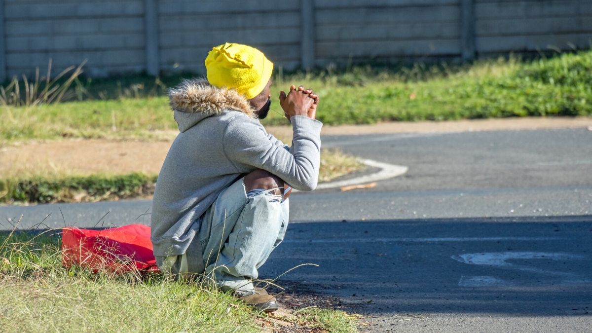 Unemployed man who qualifies for the Social Relief of Distress grant